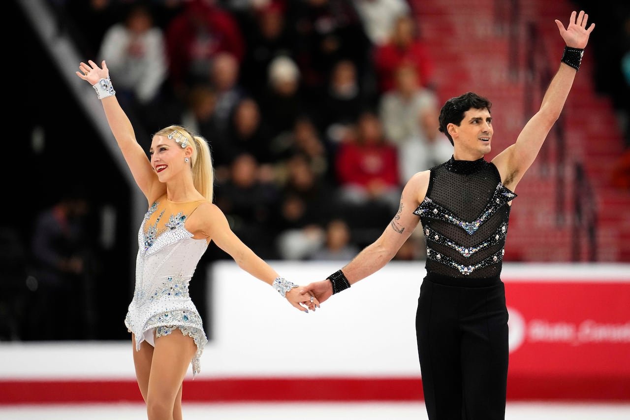Piper gilles & Paul Poirier celebrating their rhythm dance win