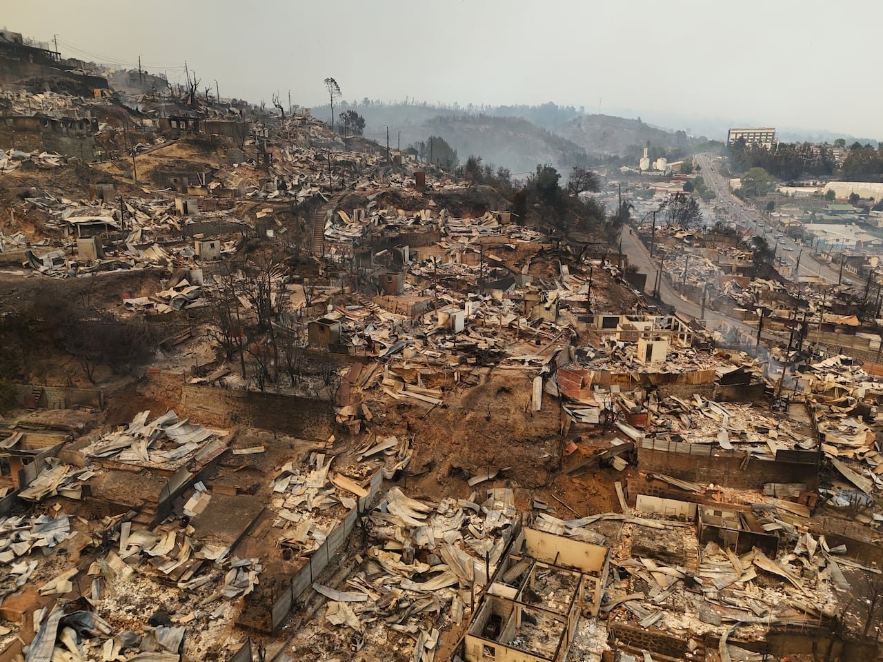 Aerial view showing homes destroyed by wildfire