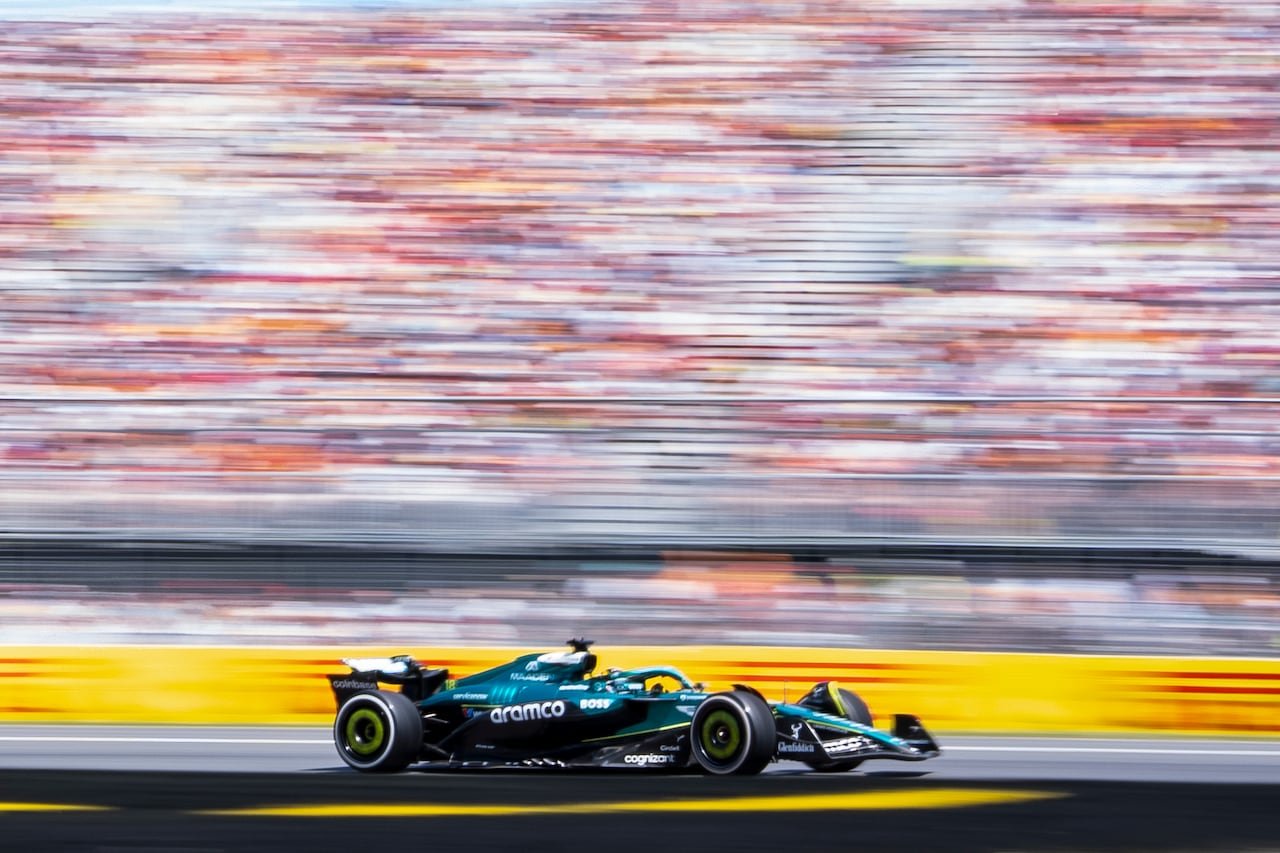 Lance Stroll piloting an Aston Martin F1 car