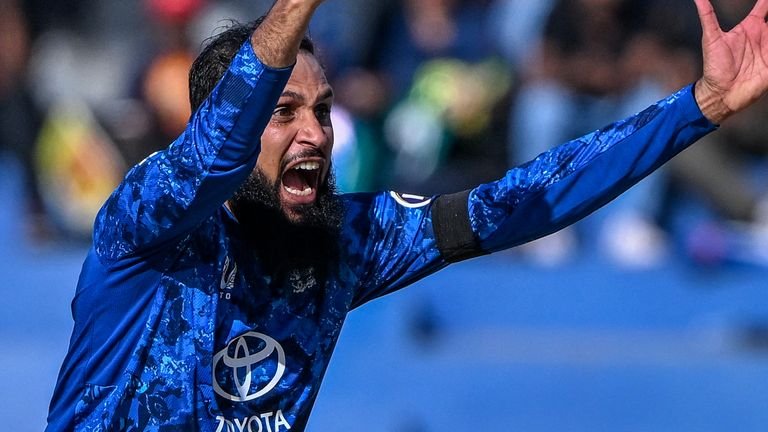 Adil Rashid bowling during cricket match