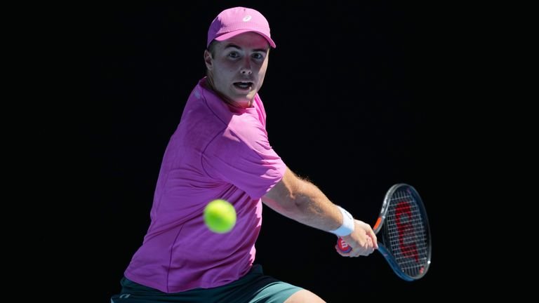 Arthur Fery returning backhand shot during Australian Open match
