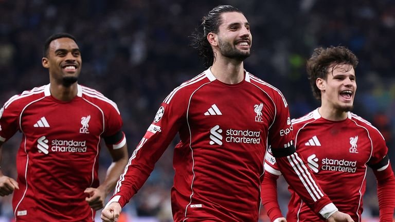 Dominik Szoboszlai celebrates after opening the scoring for Liverpool against Marseille