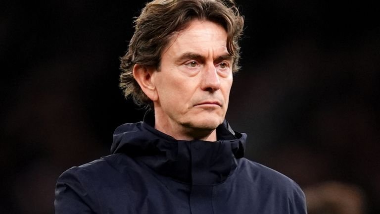 Thomas frank applauding on touchline during match