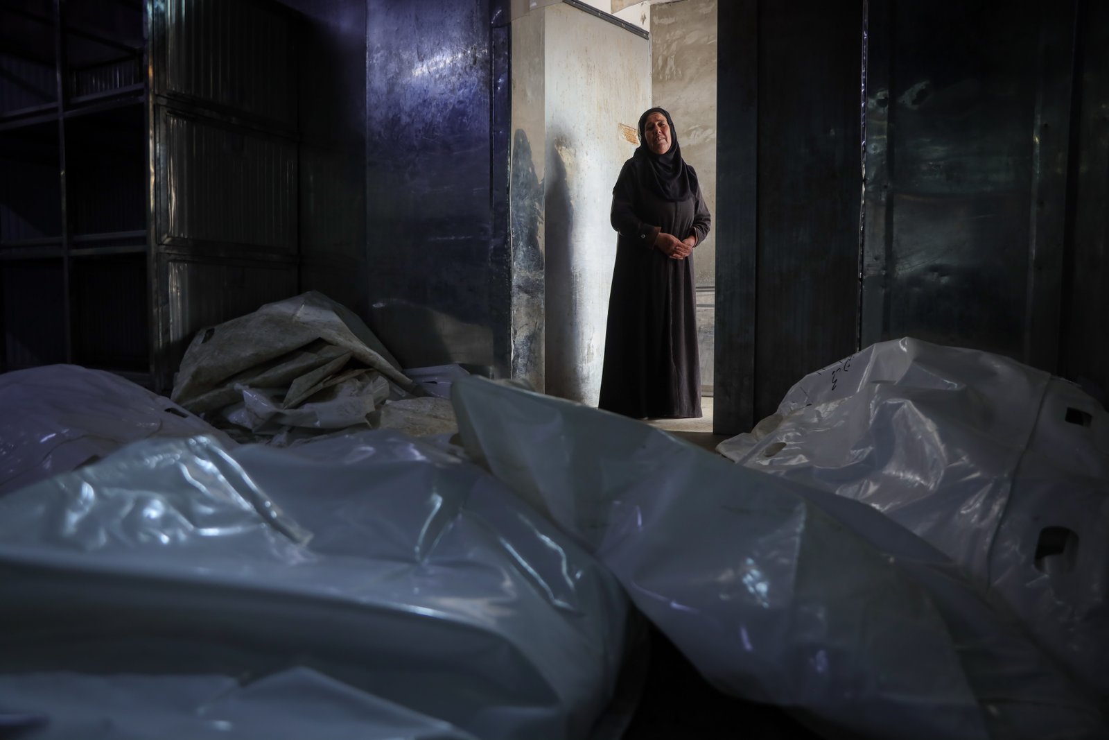 Grieving mother looking at photos