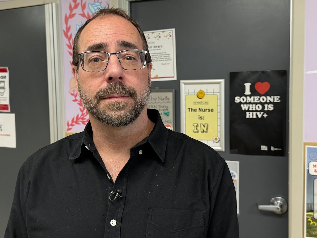 Portrait photo of community health center director discussing impact