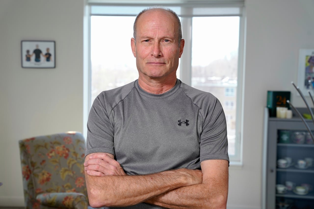 senior man smiling during workout session
