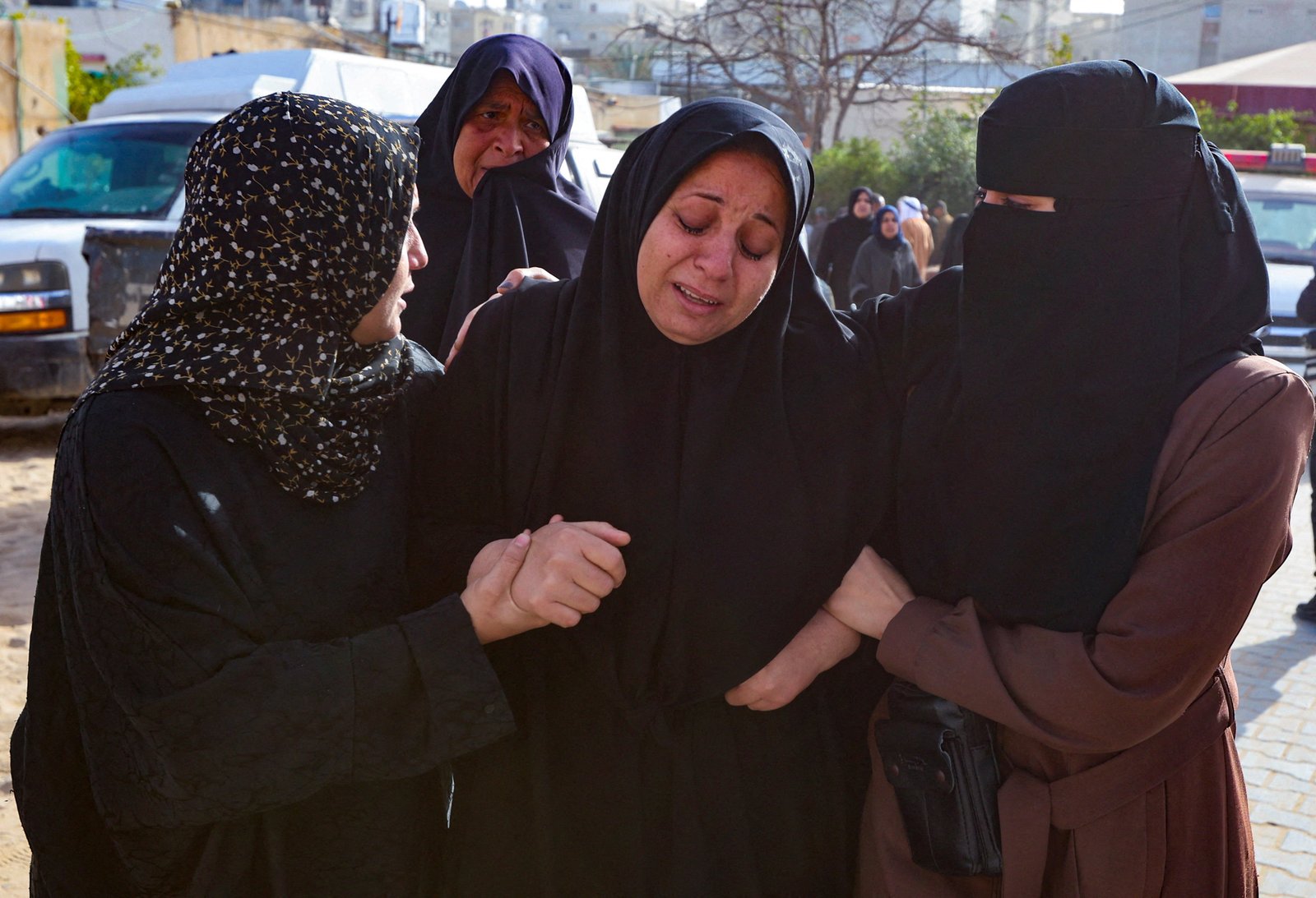 Mourners grieving victims of overnight airstrikes at Nasser Hospital funeral