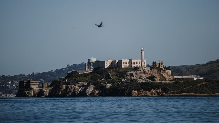 alcatraz Island overlooking dynamic sporting celebrations in San Francisco