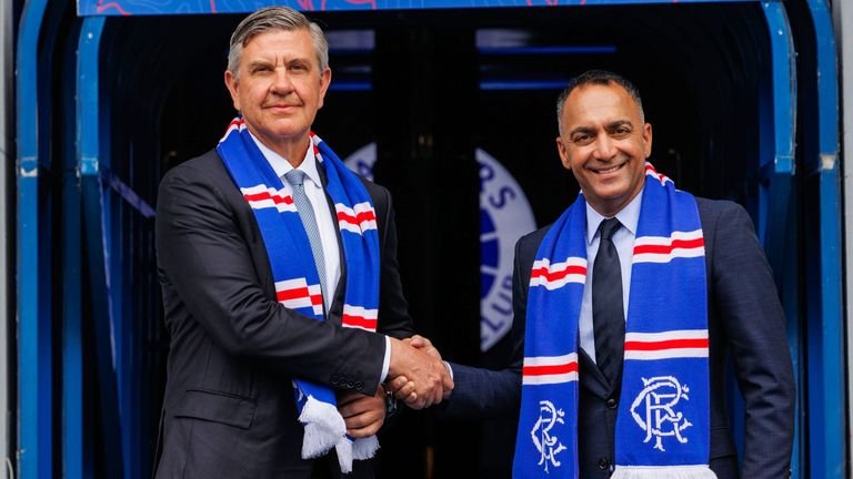 Andrew Cavenagh (L) & Paraag Marathe (R) address the media