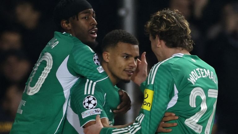 Newcastle defender Malick Thiaw celebrates his first-half header