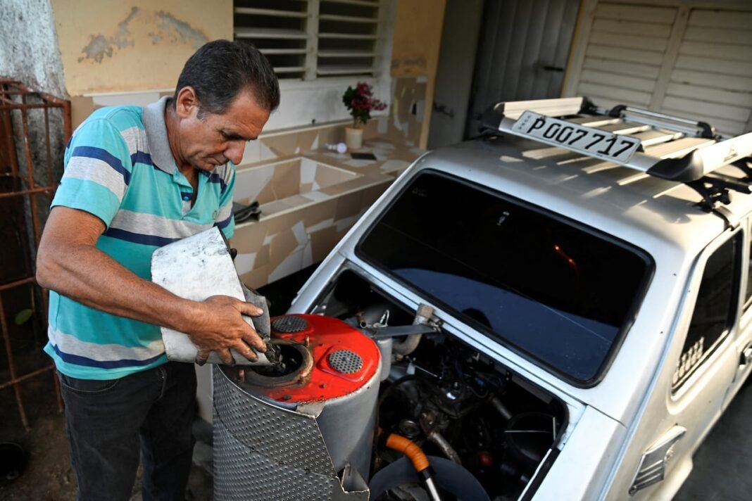 Amid fuel crunch, Cuba mechanic converts car to run on charcoal