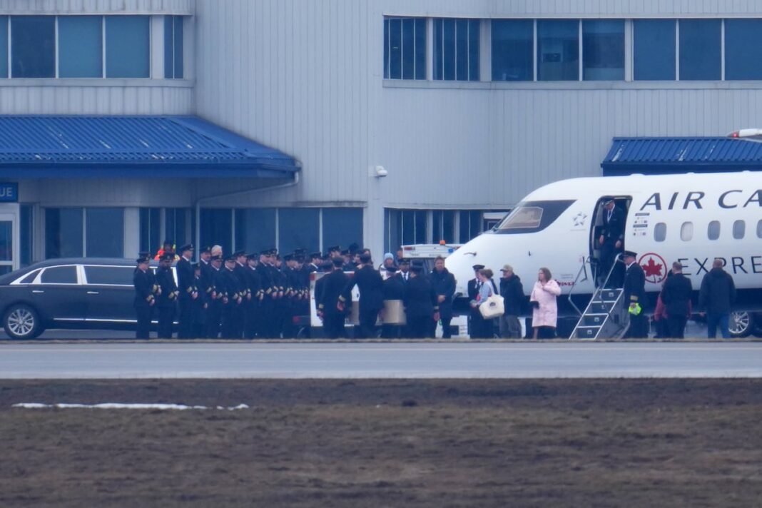 Bodies of pilots who died in collision at LaGuardia Airport being repatriated to Canada