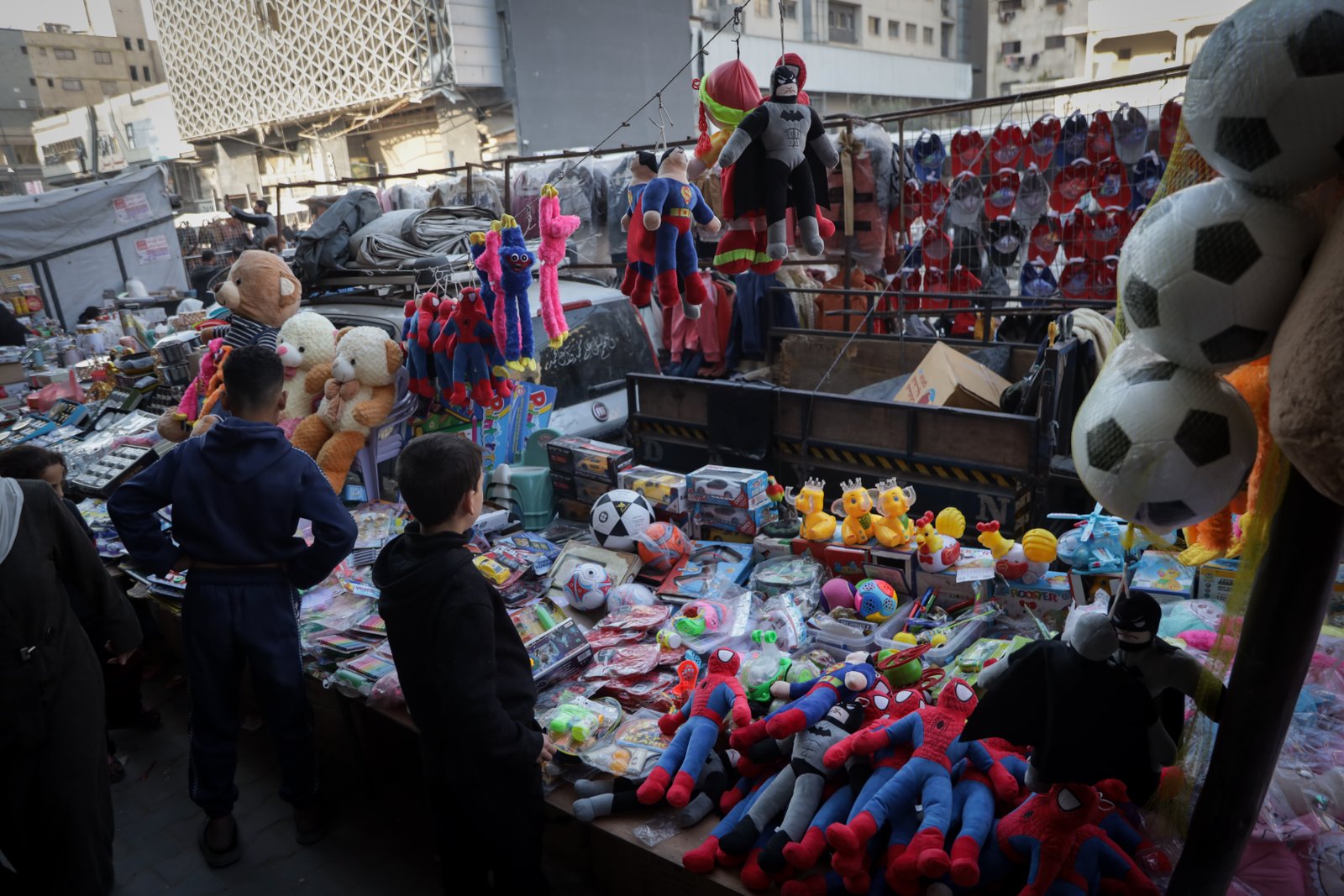Crowded toy stall with limited stock in Gaza