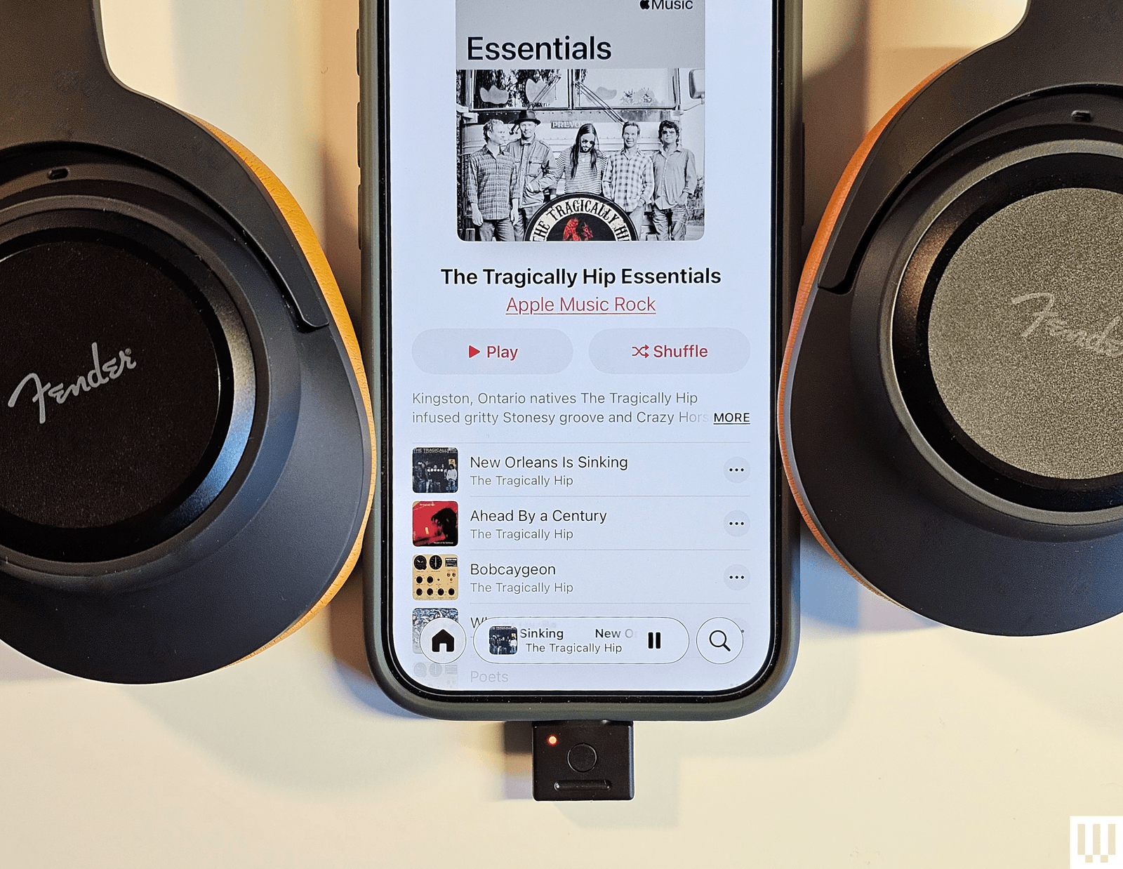 Close-up view of wireless headphone transmitter controls