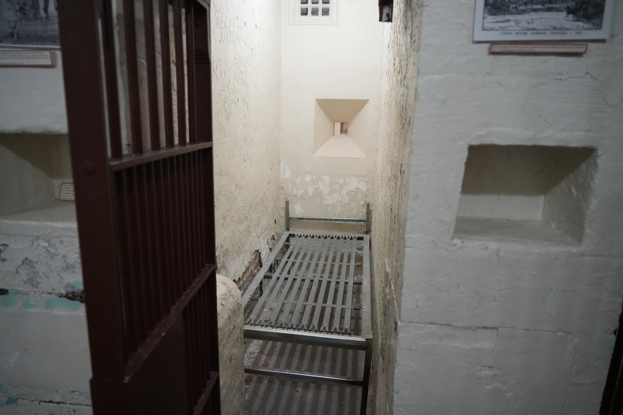 Preserved jail cell inside former Middlesex County Gaol now used for offices
