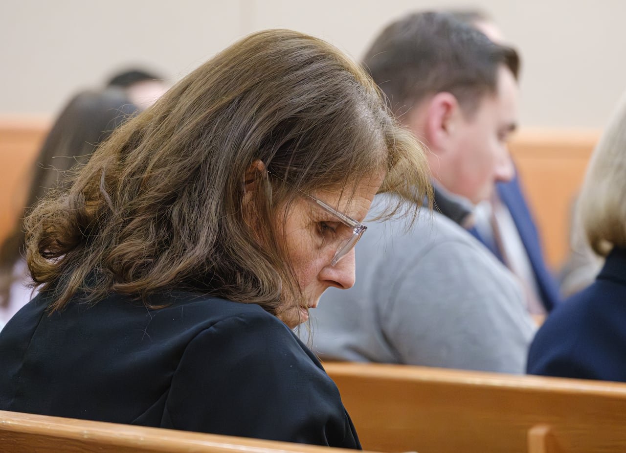 Kouri's mother listening intently during closing arguments