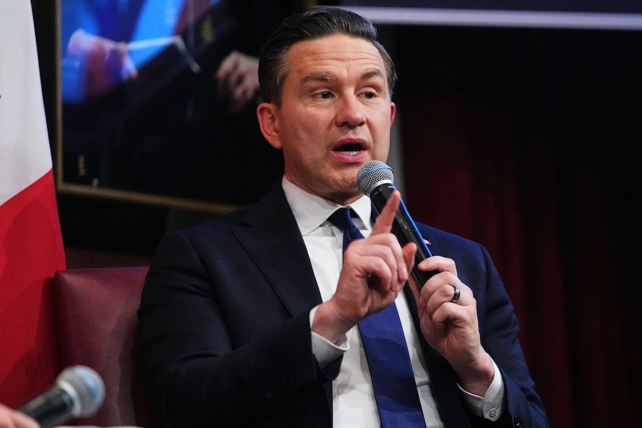 Pierre Poilievre delivering remarks at an international event