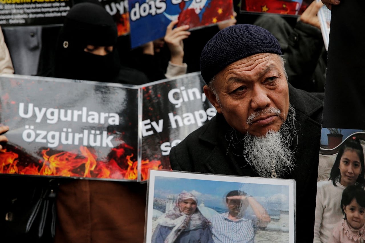 Ethnic Uyghur demonstrators protesting outside consulate