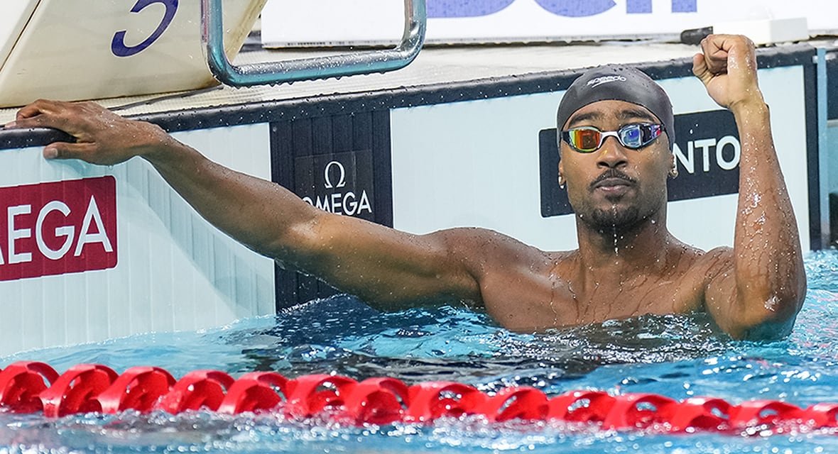 Josh Liendo celebrating after winning men's NCAA swimming final