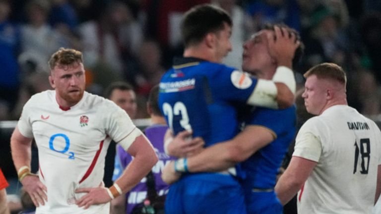 Dejected England players after loss against Italy at Six Nations