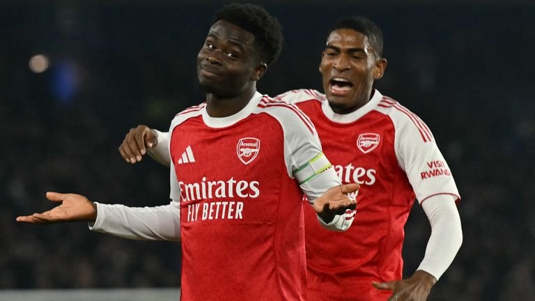 Bukayo Saka celebrates after scoring against Brighton