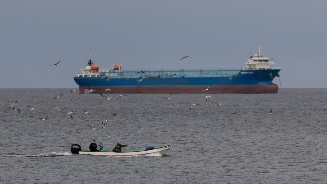 Iran says Strait of Hormuz is closed again as vessels attempting to cross come under fire