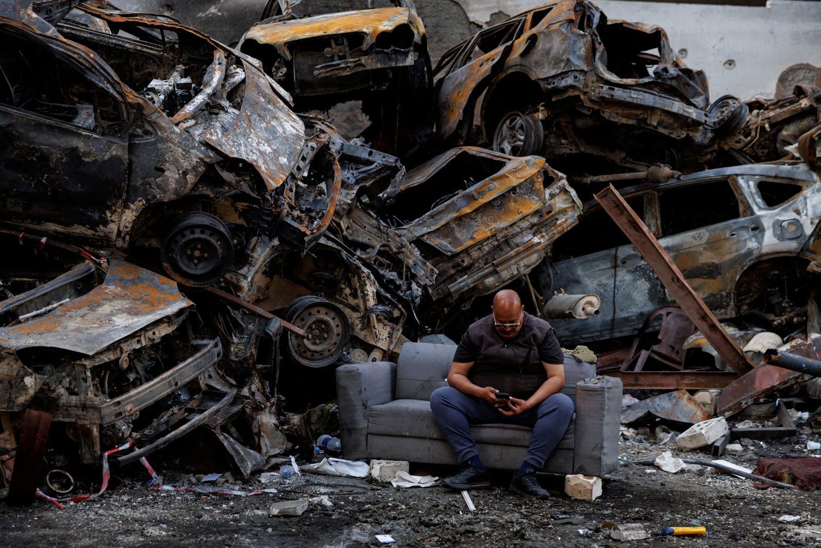 Layla Haddad near damaged buildings after Israeli airstrike in Beirut