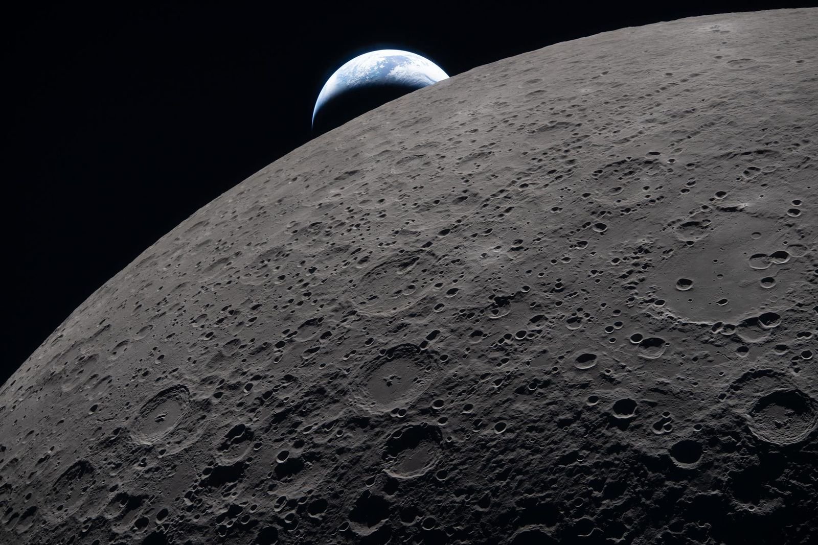 High-resolution image showing far side of moon with Earth in background