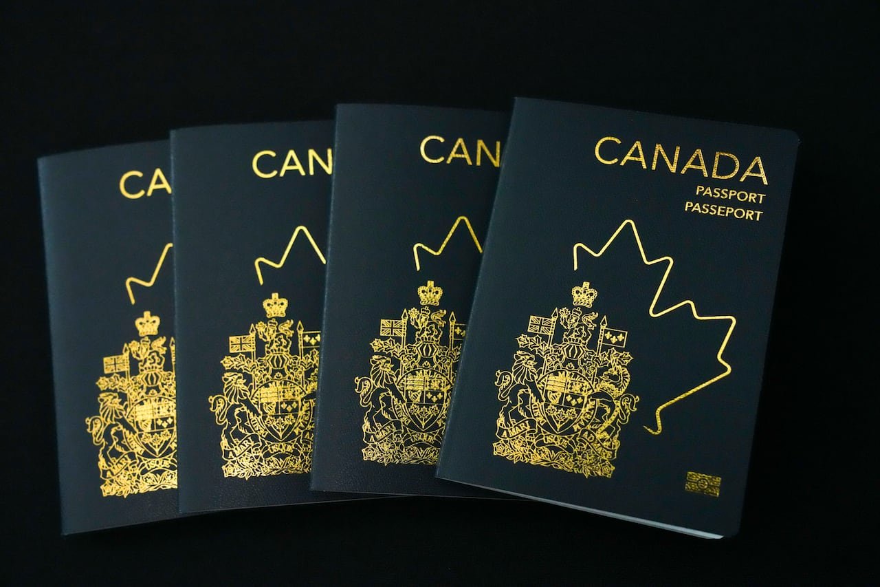 canadian passports stacked for distribution.