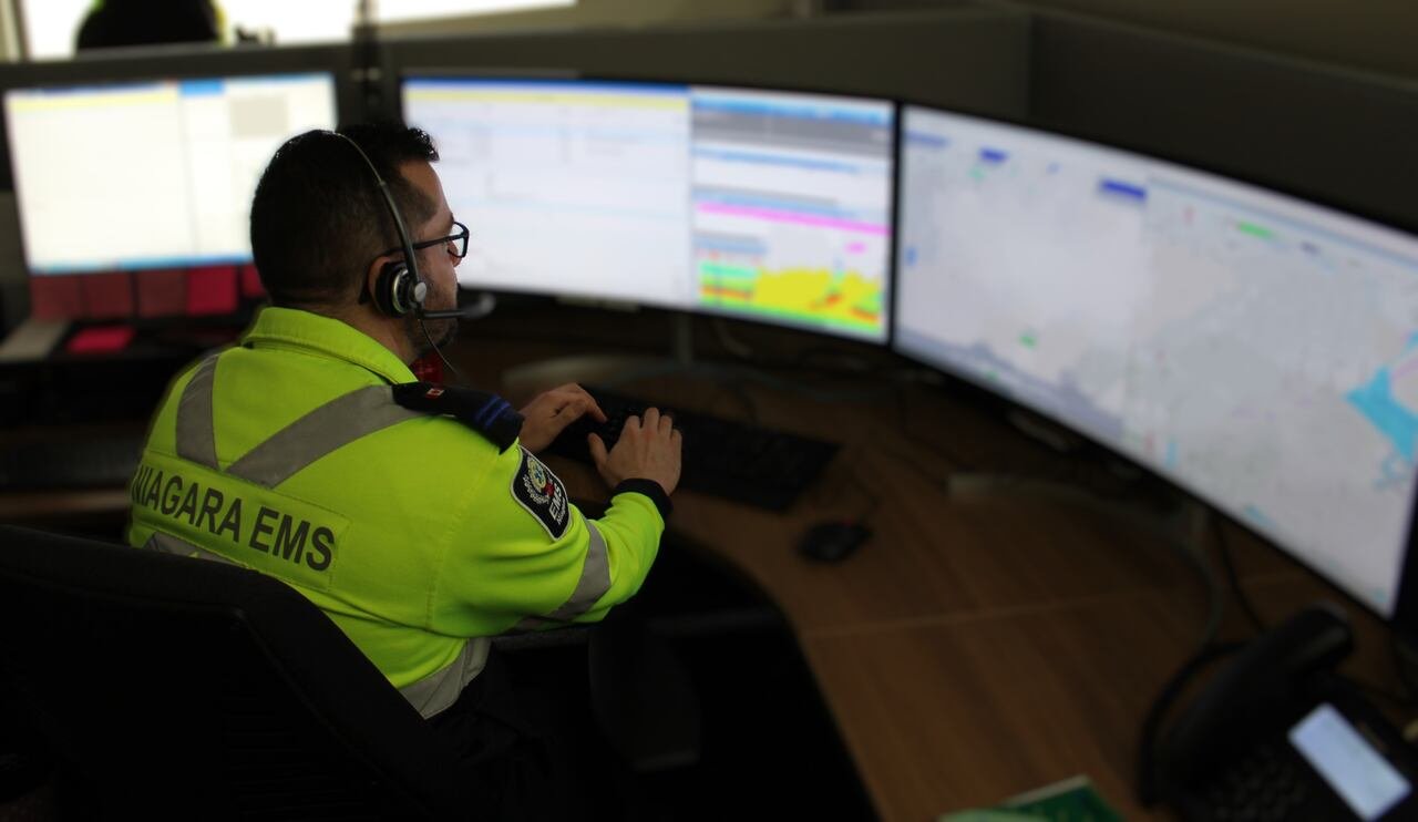 Niagara Region Public Health dispatcher monitoring emergency calls.