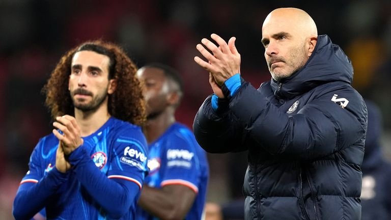 Former Chelsea manager Enzo Maresca applauds fans alongside Marc Cucurella
