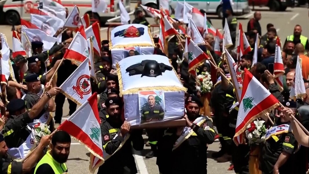 Funeral held for two Lebanese paramedics killed in Israeli attack