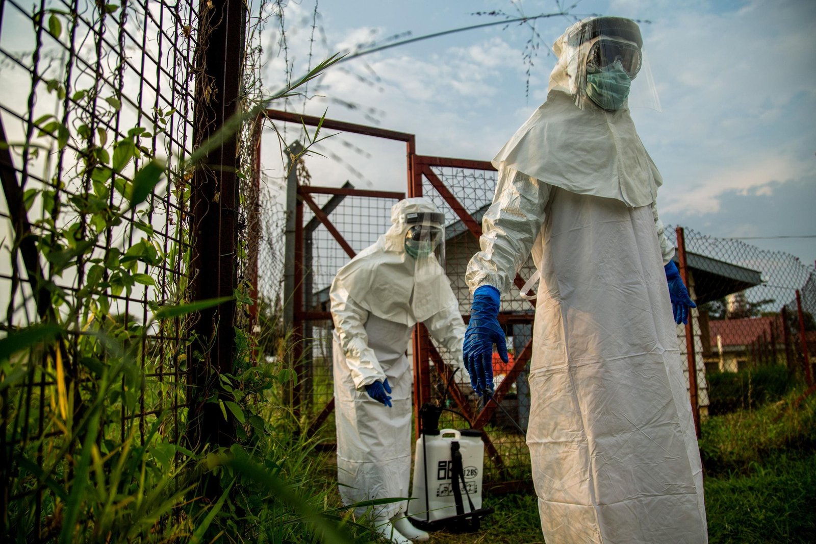 Healthcare workers preparing before entering isolation unit during Bundibugyo outbreak