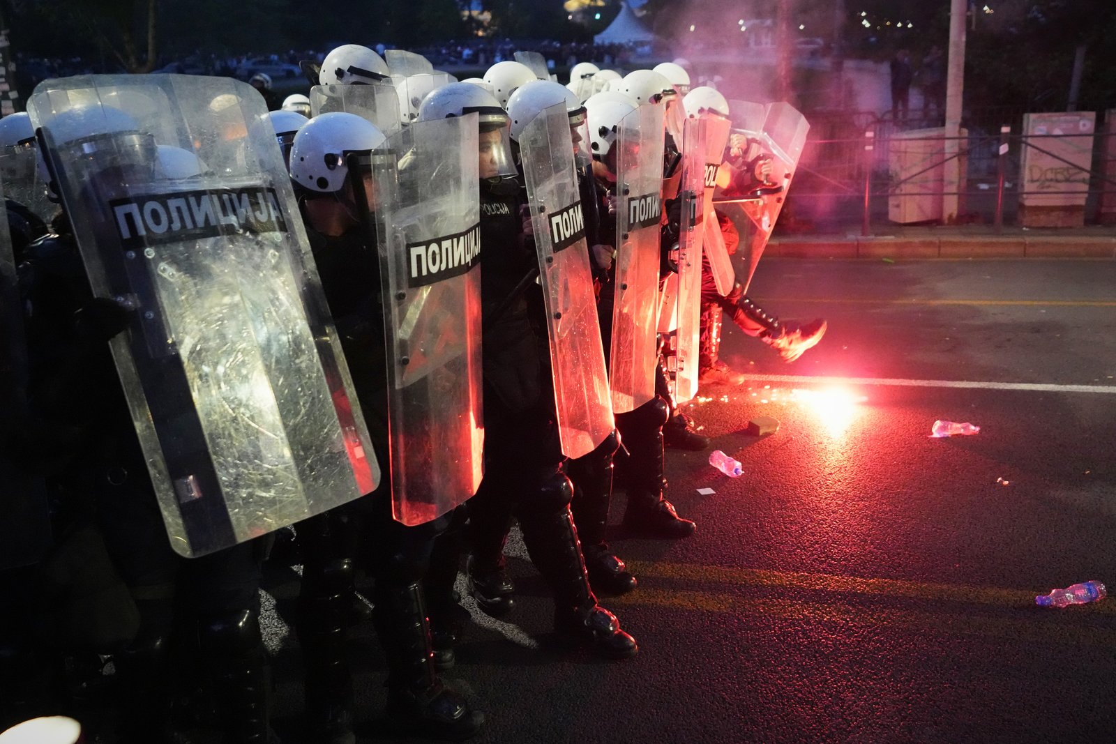 Riot police advancing during Serbian protests
