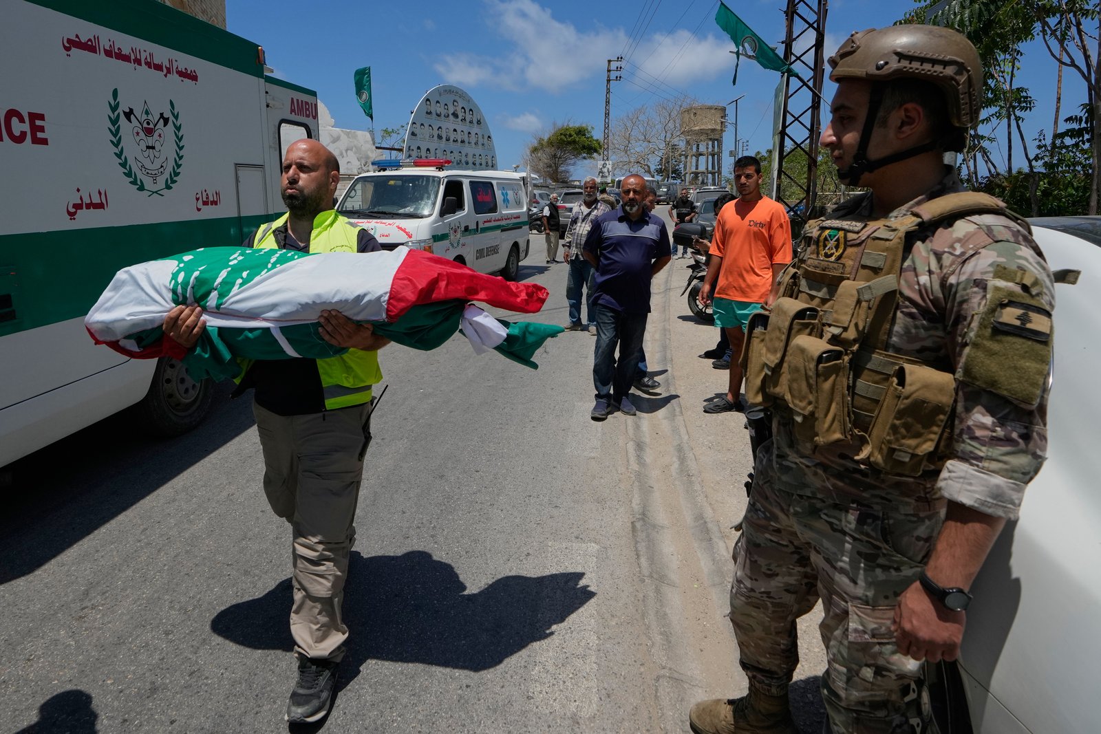 Paramedic carrying victim after airstrike near Tyre,Lebanon