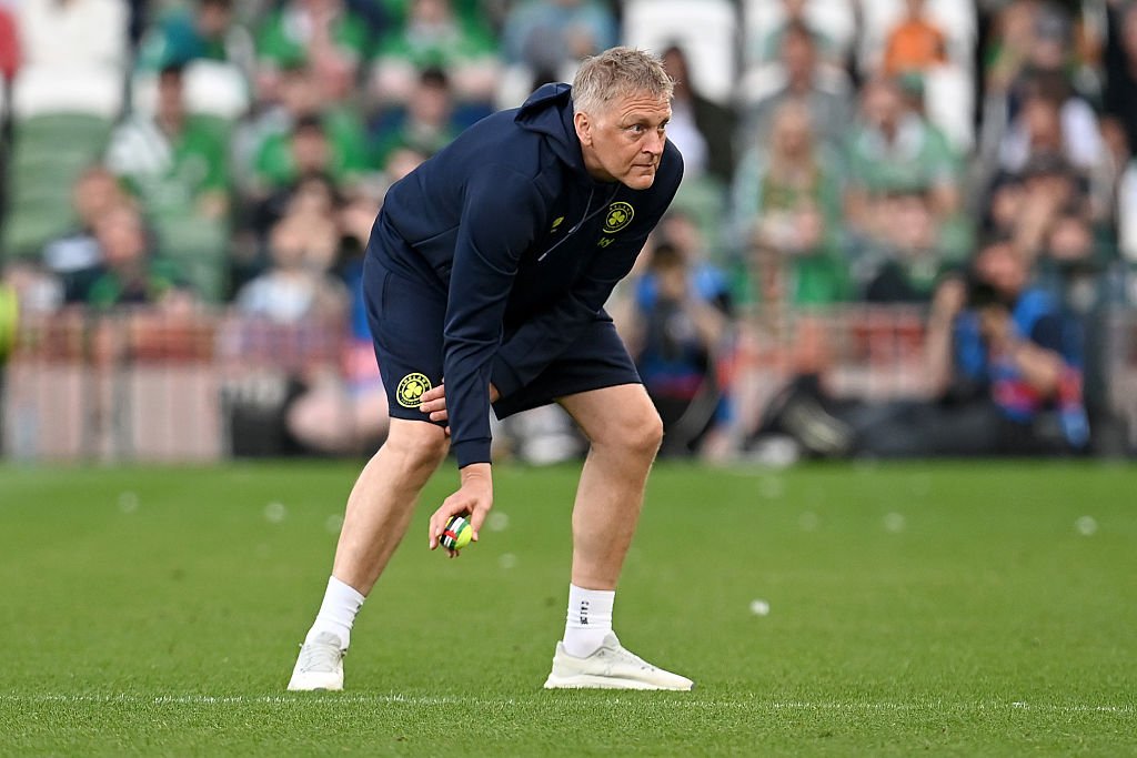 heimir Hallgrimsson clearing tennis balls thrown onto pitch during protest