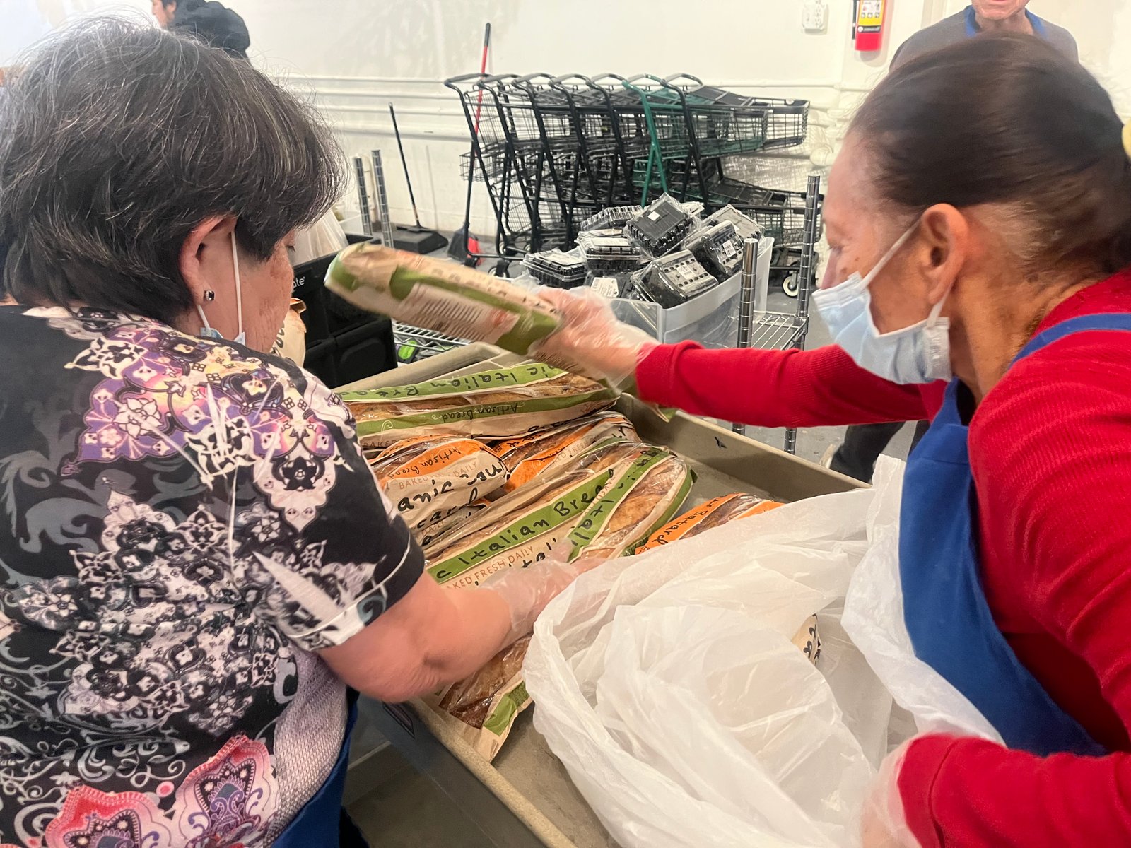 Food distribution event inside La Ofrenda Food Bank