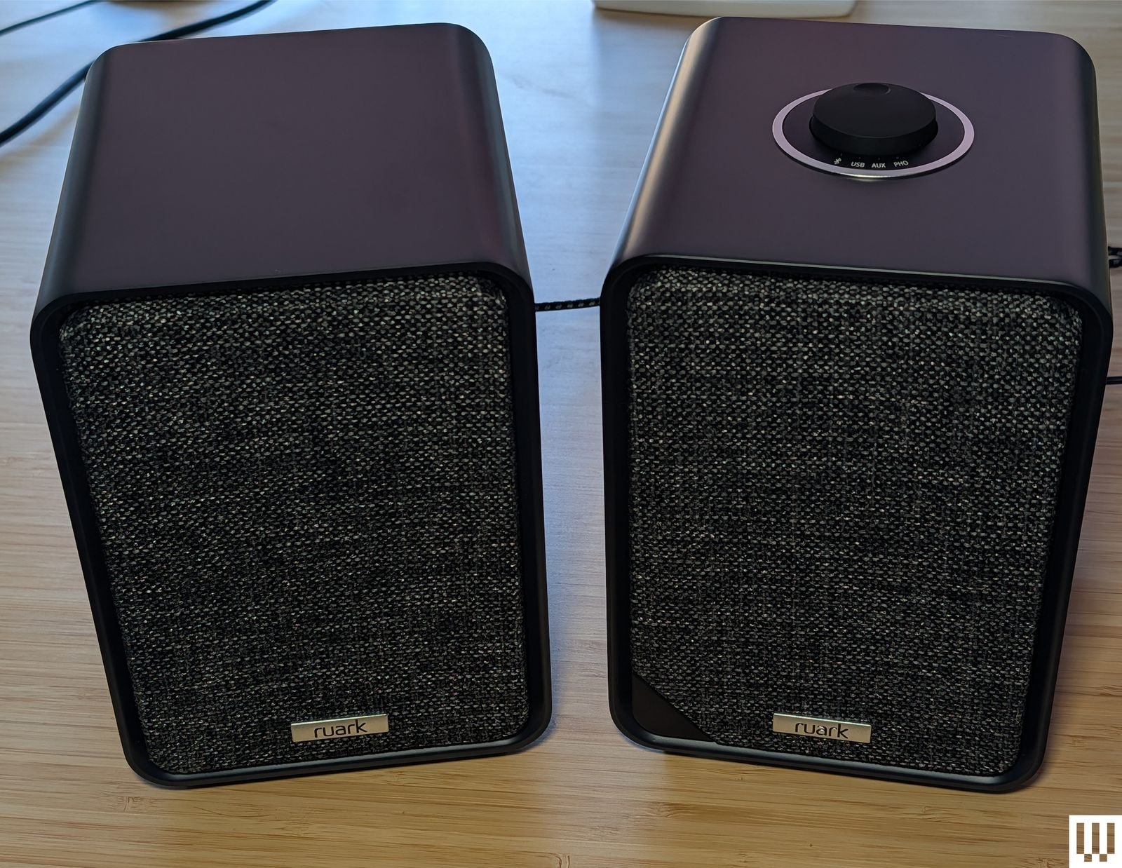 Ruark MR1 MK3 retro-style desktop speakers on wooden surface