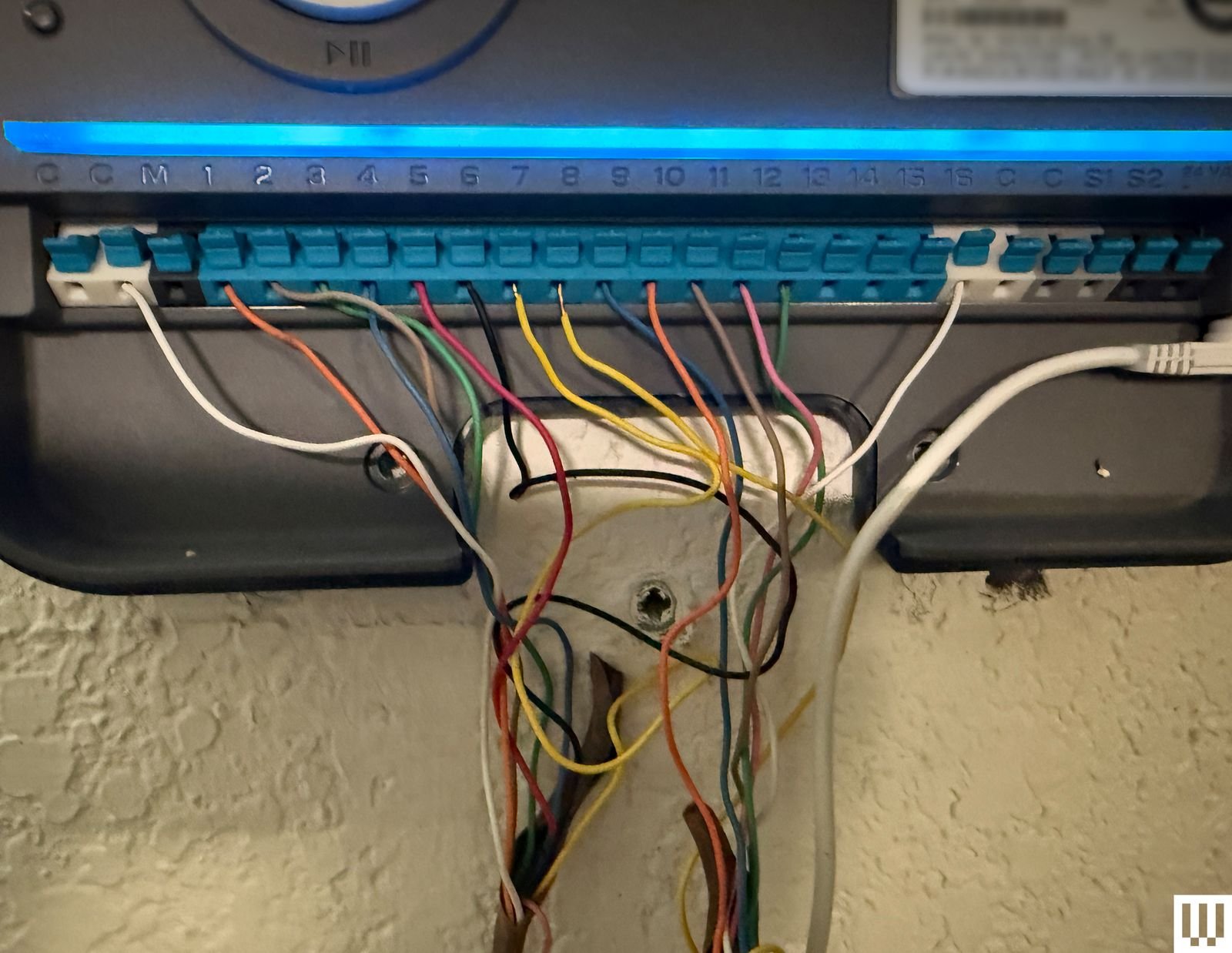 Back view of smart irrigation controller showing wiring connections