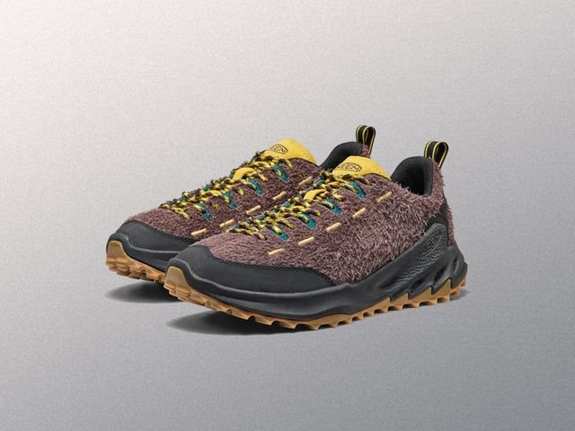 Durable hiking shoe resting on rocky ground