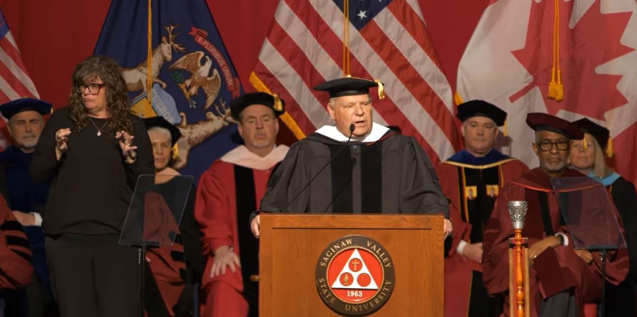 Doug Ford speaking at podium during graduation