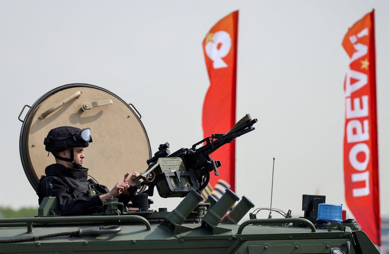 Russian soldier atop infantry vehicle during increased security measures