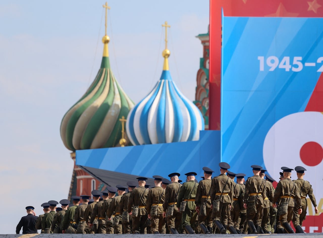 Russian soldiers marching towards decorated Red square