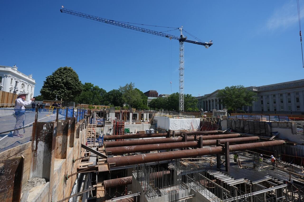 Construction site with crane and beams