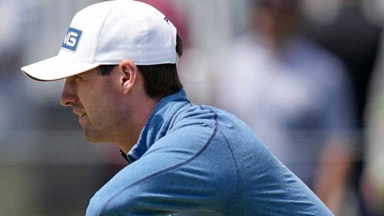 Alex Smalley lining up putt during PGA Championship