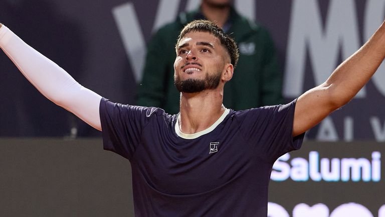 Dino Prizmic celebrating victory over Novak Djokovic