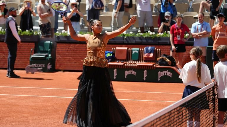 Naomi Osaka gesturing before first-round women's singles match at French Open
