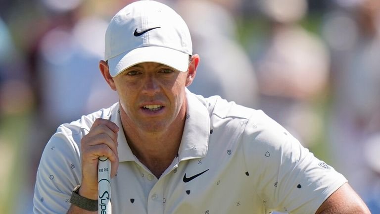 Rory McIlroy lining up shot on 16th green during PGA Championship third round