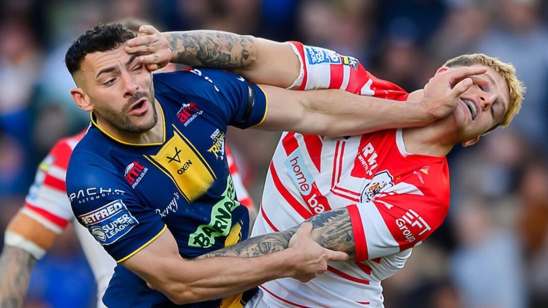 Leeds fight back to beat St Helens and move top of Super League