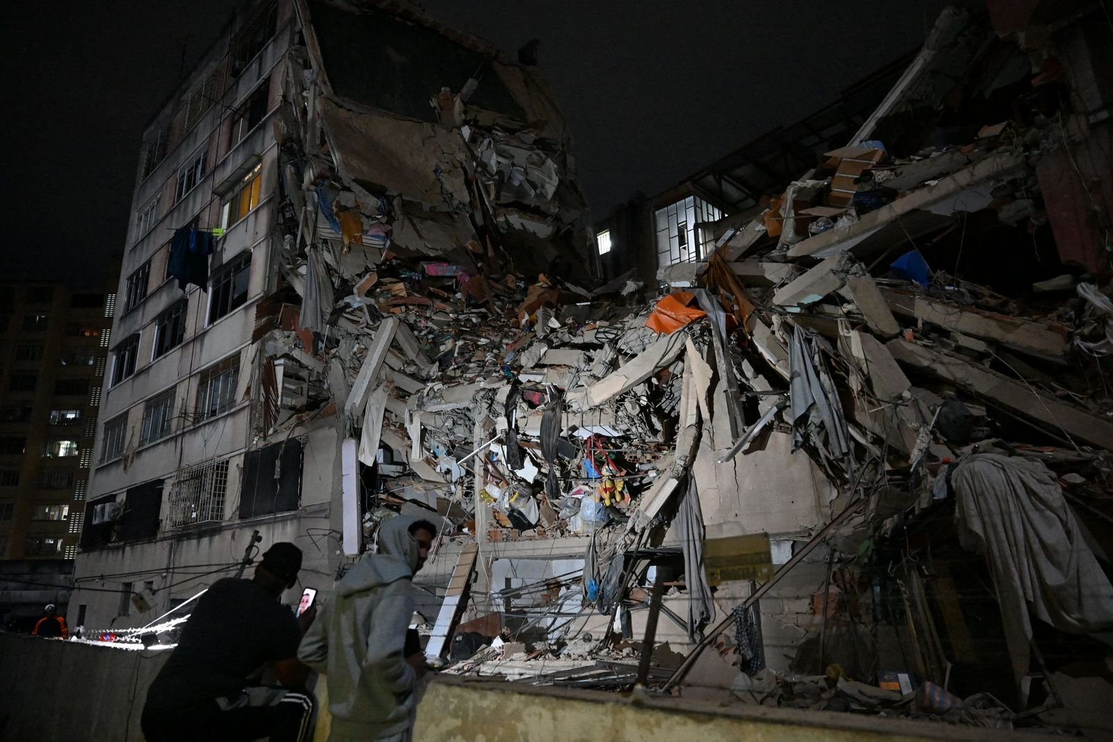 Nighttime aftermath showing destruction from Venezuelan earthquakes